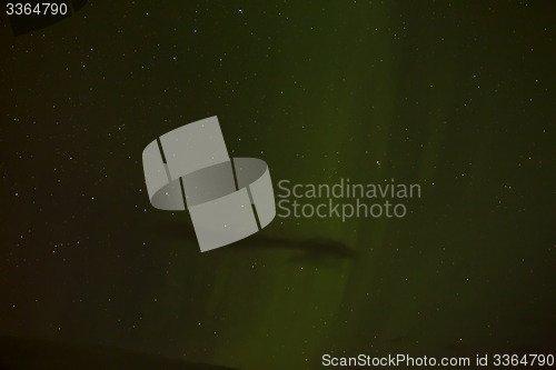 Image of Northern lights with bright stars, Iceland