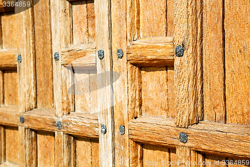 Image of door in italy   wood and t  texture nail