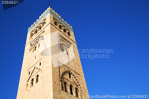Image of history in maroc   minaret religion and the blue     sky