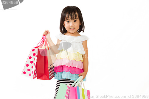 Image of Asian Kid with shopping bag