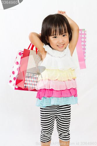 Image of Asian Kid with shopping bag