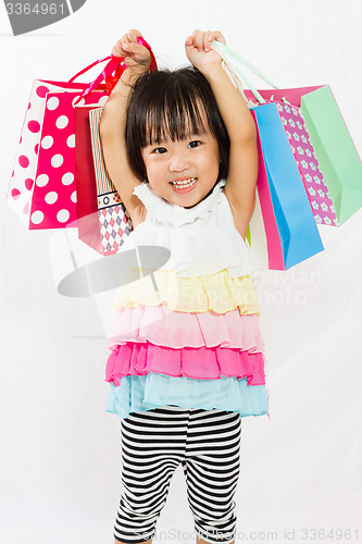 Image of Asian Kid with shopping bag