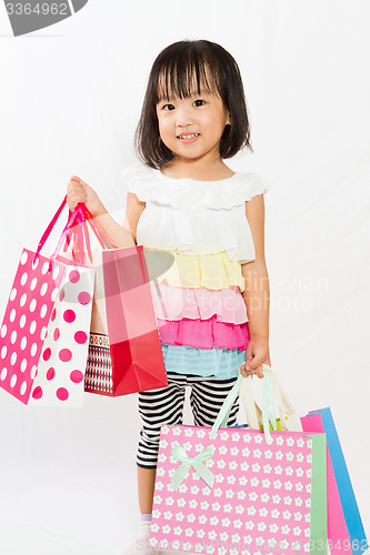 Image of Asian Kid with shopping bag