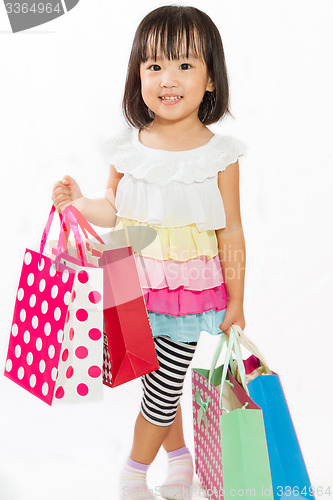Image of Asian Kid with shopping bag