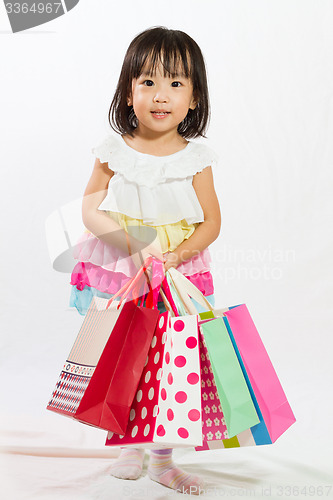 Image of Asian Kid with shopping bag