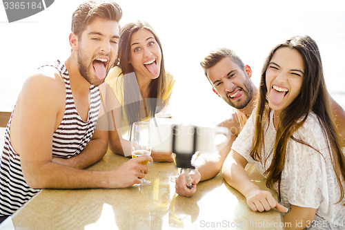Image of Group selfie at the beach bar
