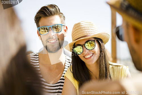 Image of Friends at the beach bar