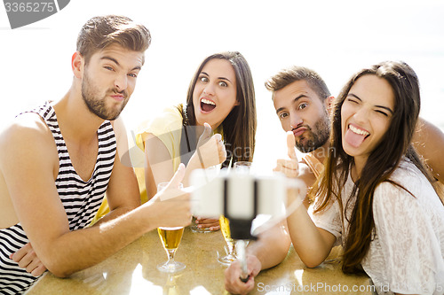 Image of Group selfie at the beach bar