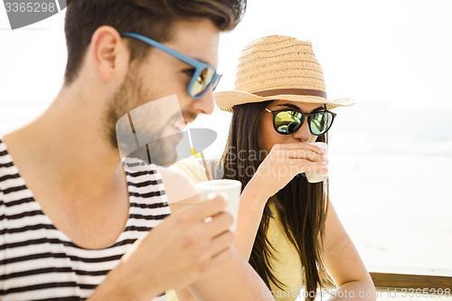 Image of Friends at the beach bar