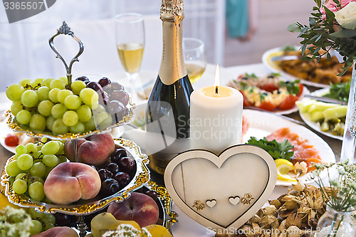 Image of Wedding table with heart-shaped decoration