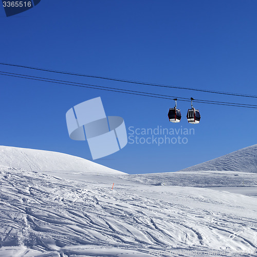 Image of Two gondola lifts at ski resort