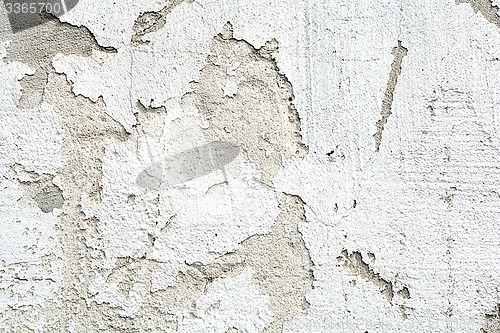 Image of Vintage or grungy white background of natural cement or stone old texture as a retro pattern wall.  It is a concept, conceptual or metaphor wall banner, grunge, material, aged, rust or construction.