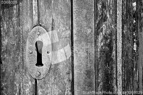 Image of  traditional   door    in italy   ancian wood and traditional  t