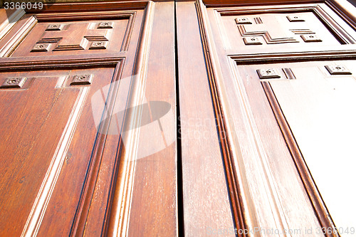 Image of   brown old door in italy europe