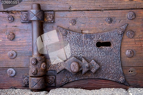 Image of castle lock   lanzarote abstract door wood in the red brown 