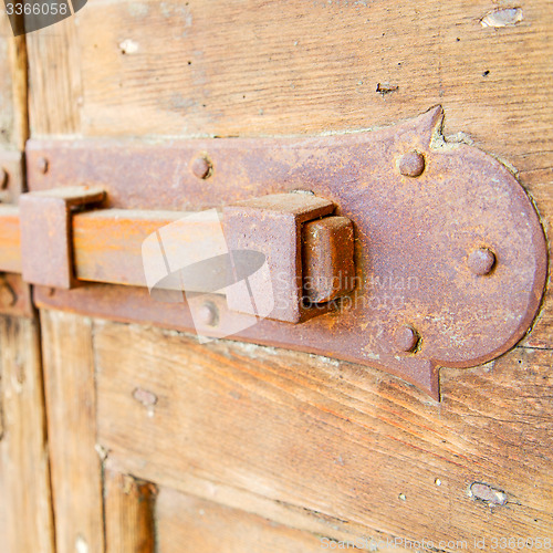 Image of europe old in  italy  antique close brown door and rusty lock  c