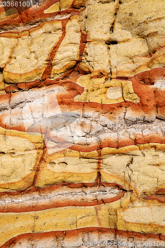 Image of  a broke  stone and lichens 