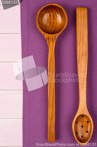Image of Kitchenware on purple towel