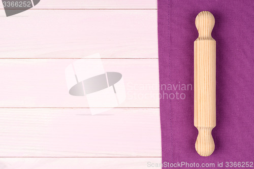Image of Kitchenware on purple towel