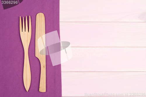 Image of Kitchenware on purple towel
