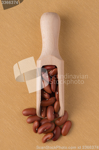 Image of Wooden scoop with red beans