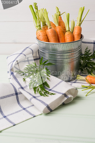 Image of Carrots on wooden table