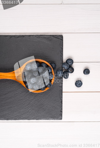 Image of Blueberries on a wooden spoon