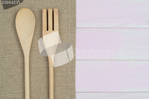 Image of Kitchenware on beige towel