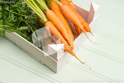 Image of Carrots on wooden table