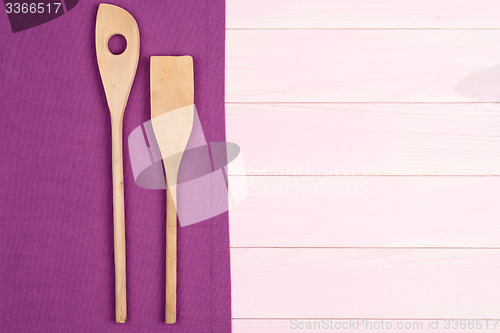 Image of Kitchenware on purple towel