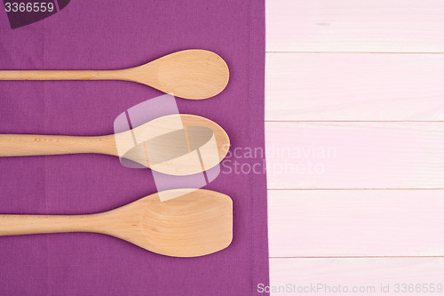 Image of Kitchenware on purple towel