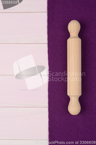 Image of Kitchenware on purple towel