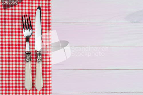 Image of Kitchenware on red towel