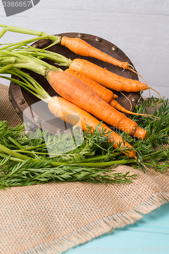 Image of Carrots on a wooden table