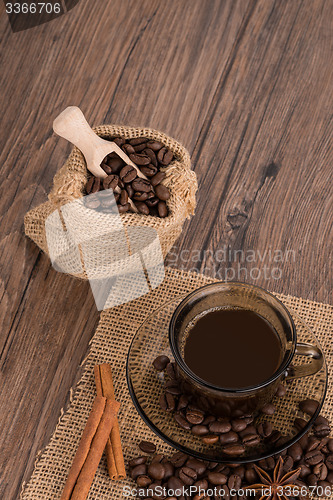 Image of Coffee cup with burlap sack