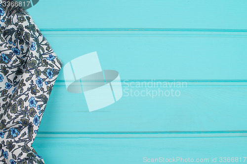 Image of Blue and white towel over table