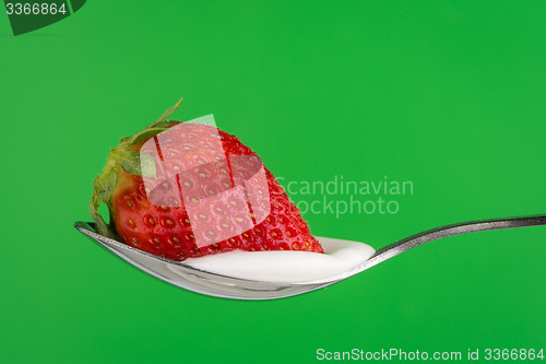 Image of Strawberry and chocolate on a fork