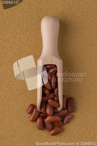 Image of Wooden scoop with red beans