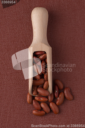 Image of Wooden scoop with red beans
