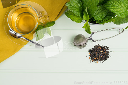 Image of Herbal tea with melissa in a glass cup