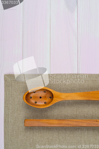 Image of Kitchenware on beige towel