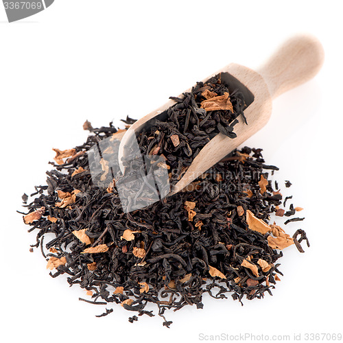 Image of Black Dry Tea with a Wooden Spoon