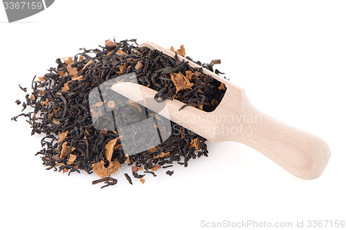 Image of Black Dry Tea with a Wooden Spoon