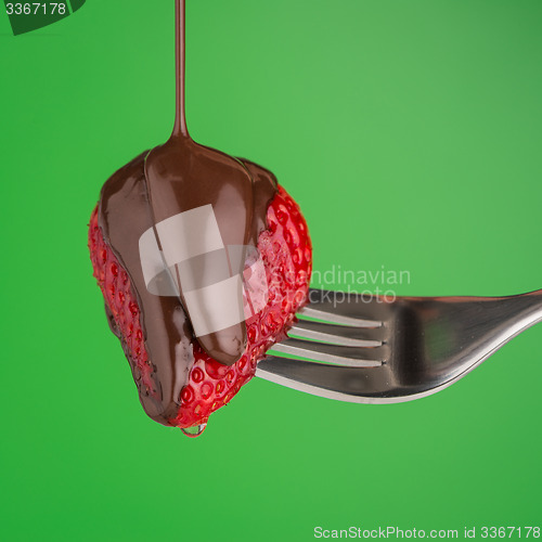 Image of Strawberry and chocolate on a fork