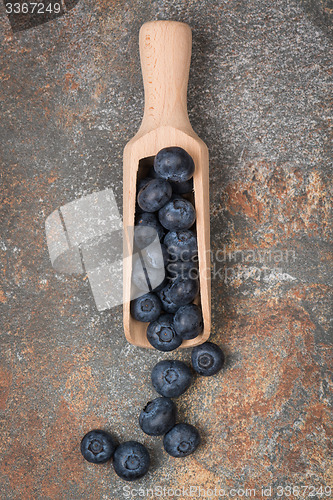 Image of Blueberries on a wooden spoon