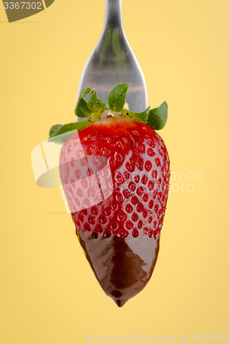 Image of Strawberry and chocolate on a fork