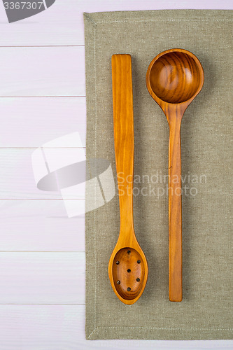 Image of Kitchenware on beige towel