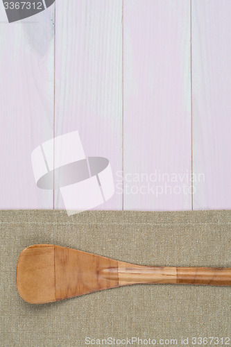 Image of Kitchenware on beige towel