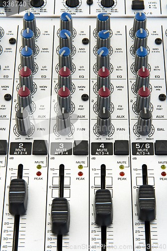 Image of Faders and knobs of sound mixer