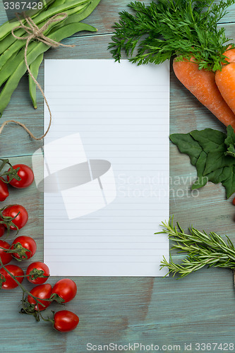 Image of White paper and vegetables